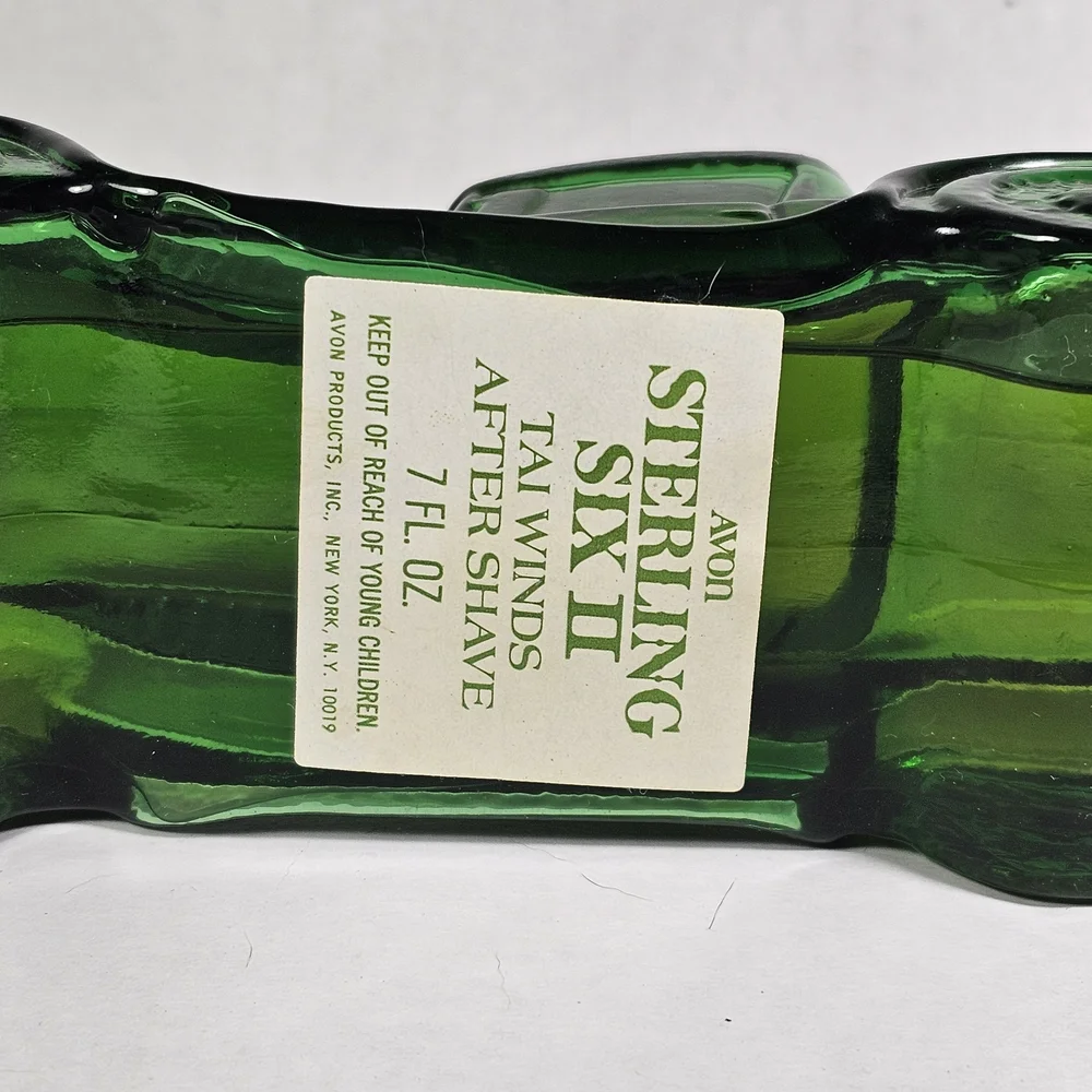 Avon Sterling Six II Green Glass Car Bottle